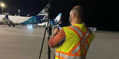 Jean-Paul Ojeil measuring the light levels at Halifax Airport